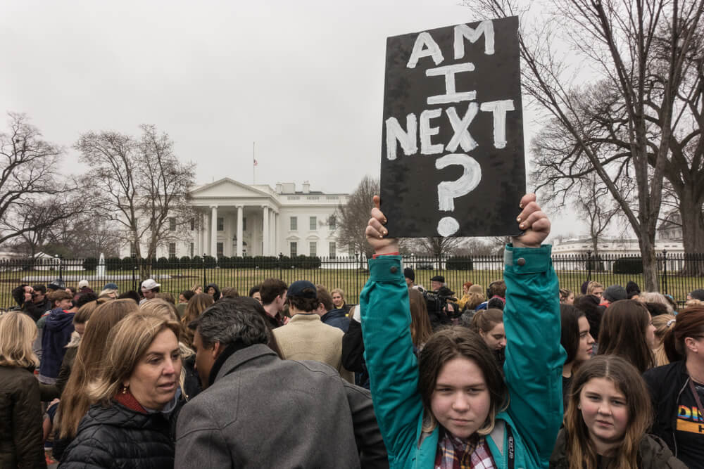 students outside of a school that recently had a school shooting